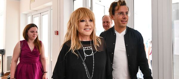 Максим Галкин и Алла Пугачева во время голосования на выборах мэра Москвы (9 сентября 2018). Москвa - Sputnik Армения