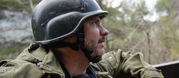 Специальный фотокорреспондент МИА Россия сегодня Андрей Стенин - Sputnik Армения