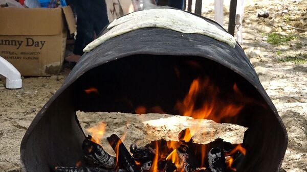 Մին ասի`«կծմնձուկ». արցախցիները փորձության էին ենթարկում ժենգյալով հացի փառատոնի հյուրերին Մին ասի`«կծմնձուկ». արցախցիները փորձության էին ենթարկում ժենգյալով հացի փառատոնի հյուրերին - Sputnik Արմենիա