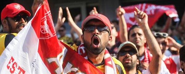 Болельщик футбольного клуба Арсенал во время товарищеского матча против Чивас Гвадалахара (31 июля 2016). Карсон - Sputnik Армения