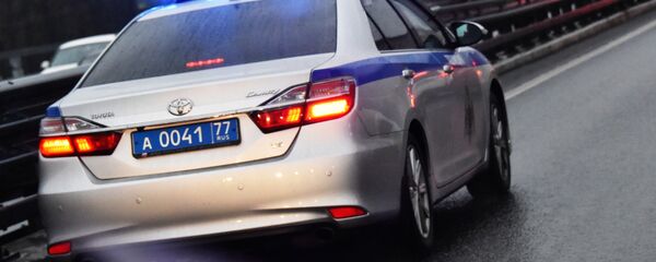 Автомобиль полиции на дороге в Москве.  - Sputnik Արմենիա