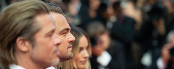 Актеры Брэд Питт, Леонардо ДиКаприо и Марго Робби на красной дорожке фильма Однажды... в Голливуде (Once Upon a Time in Hollywood) в рамках 72-го Каннского кинофестиваля (21 мая 2019). Канны - Sputnik Армения