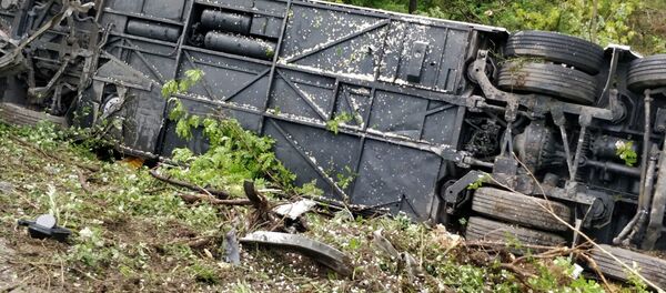 Перевернутый туристический автобус (22 мая 2019). Монтериджони, Италия Перевернутый туристический автобус (22 мая 2019). Монтериджони, Италия - Sputnik Армения