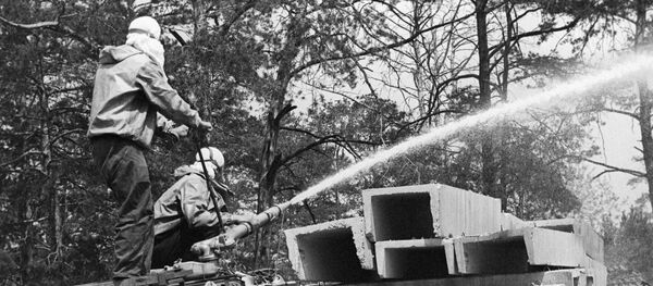Дезактивация Чернобыльской АЭС, где 26 апреля 1986 года в четвертом энергоблоке произошла авария. - Sputnik Армения