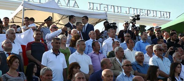 Болельщики на трибуне Авагян Арена во время футбольного матча ConIFA между сборными Восточной Армении и Южной Осетии (2 июня 2019). Мартуни Болельщики на трибуне Авагян Арена во время футбольного матча ConIFA между сборными Восточной Армении и Южной Осетии (2 июня 2019). Мартуни - Sputnik Արմենիա