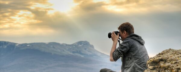 Фотограф в горах Фотограф в горах - Sputnik Армения