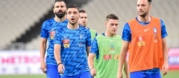 Футболисты сборной Греции на разминке перед началом футбольного матча отборочного тура Евро-2020 между сборными Греции и Армении (11 июня 2019). Афины - Sputnik Армения