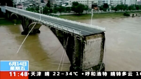 Рухнувший мост в Хэйюань, провинция Гуандун (14 июня 2019). Китай  - Sputnik Армения