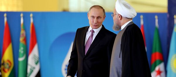 Президенты России и Ирана Владимир Путин и Хасан Роухани во время саммита Форума стран-экспортеров газа (23 ноября 2015). Тегеран - Sputnik Армения