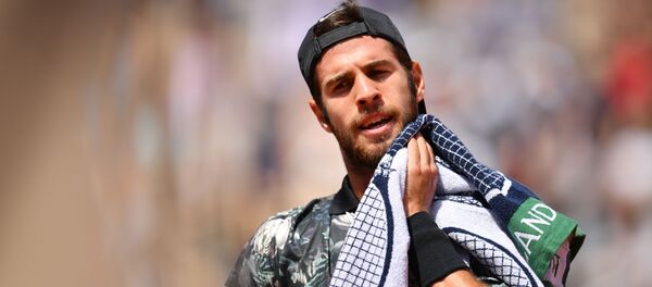 Карен Хачанов (Россия) в матче 1/4 финала мужского одиночного разряда Открытого чемпионата Франции по теннису против австрийца Доминика Тима (6 июня 2019). Париж Карен Хачанов (Россия) в матче 1/4 финала мужского одиночного разряда Открытого чемпионата Франции по теннису против австрийца Доминика Тима (6 июня 2019). Париж - Sputnik Армения