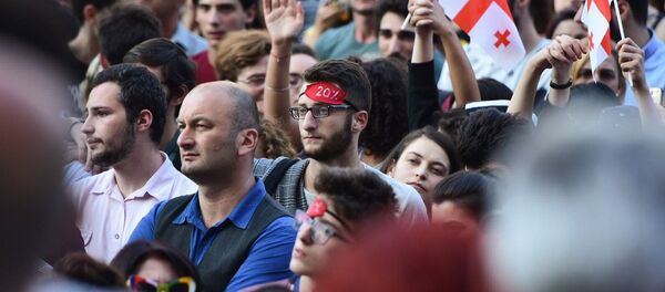 Участники акции протеста у здания парламента Грузии (21 июня 2019). Тбилиси Участники акции протеста у здания парламента Грузии (21 июня 2019). Тбилиси - Sputnik Արմենիա