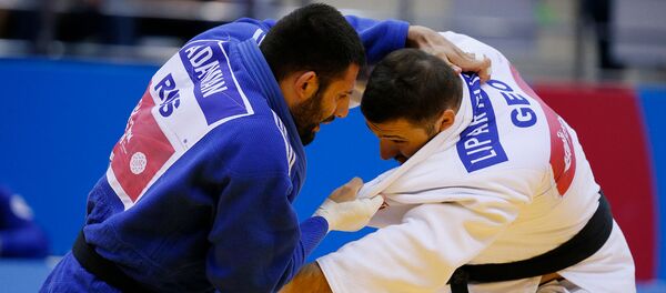 Арман Адамян (Россия) в бою с Варламом Липартелиани (Грузия) во время финального матча по дзюдо среди мужчин в весовой категории 100кг (24 июня 2019). Минск Арман Адамян (Россия) в бою с Варламом Липартелиани (Грузия) во время финального матча по дзюдо среди мужчин в весовой категории 100кг (24 июня 2019). Минск - Sputnik Армения