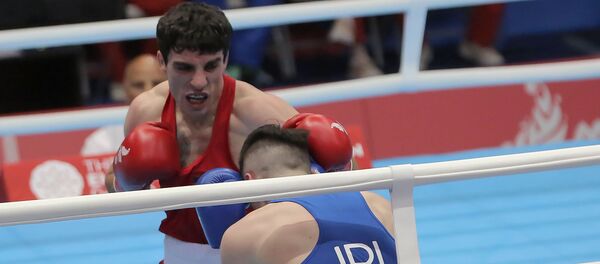 Поединок 1/8 финала по боксу среди мужчин в весовой категории до 64 кг между Ованнесом Бачковым (Армения) и Джеймсом Макгиверном (Ирландия) (25 июня 2019). Минск - Sputnik Արմենիա