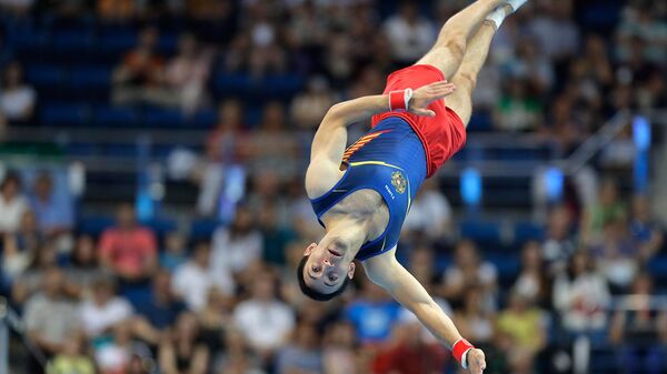 Гимнаст Артур Давтян (Армения) в финале мужских вольных упражнений на Вторых Европейских играх (30 июня 2019). Минск - Sputnik Армения