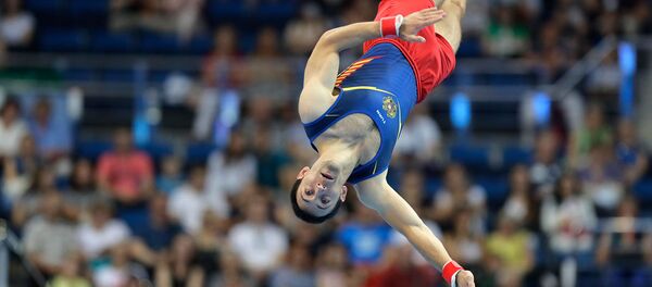 Гимнаст Артур Давтян (Армения) в финале мужских вольных упражнений на Вторых Европейских играх (30 июня 2019). Минск Гимнаст Артур Давтян (Армения) в финале мужских вольных упражнений на Вторых Европейских играх (30 июня 2019). Минск - Sputnik Армения