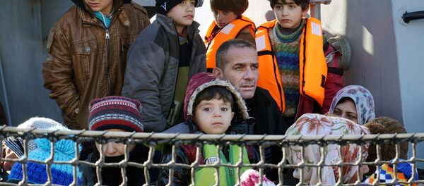 Мигранты, прибывшие на в Грецию, на остров Лесбос Мигранты, прибывшие на в Грецию, на остров Лесбос - Sputnik Армения