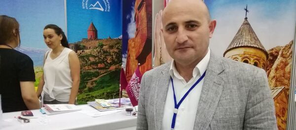 Мехак Апресян на туристической выставке в Узбекистане (9 июля 2019). Самарканд - Sputnik Армения
