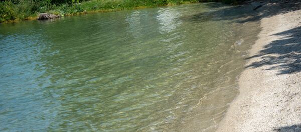 Озеро Севан, побережье у села Чкаловка, Гегаркуник Озеро Севан, побережье у села Чкаловка, Гегаркуник - Sputnik Արմենիա