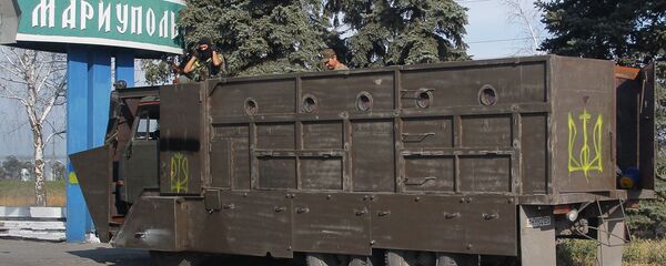 Грузовик у въезда в город Мариуполь - Sputnik Армения