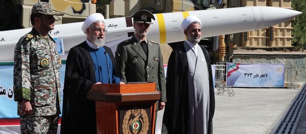 Президент Ирана Хасан Роухани во время презентации ЗРК иранского производства Бавар-373 (22 августа 2019). Иран Президент Ирана Хасан Роухани во время презентации ЗРК иранского производства Бавар-373 (22 августа 2019). Иран - Sputnik Армения