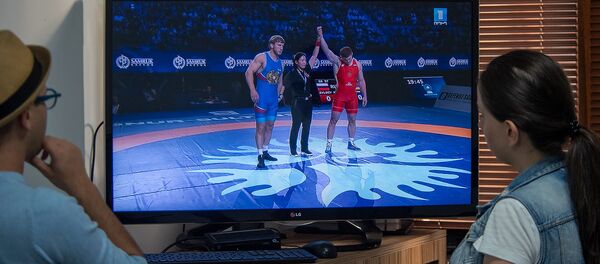 Болельщики наблюдают за финалом греко-римской борьбы (16 сентября 2019). Еревaн Болельщики наблюдают за финалом греко-римской борьбы (16 сентября 2019). Еревaн - Sputnik Армения