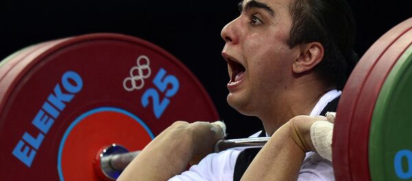 Мелине Далузян в женской группе A по тяжелой атлетике в весовой категории 69кг Олимпийских игр 2012 года (1 августа 2012). Лондон Мелине Далузян в женской группе A по тяжелой атлетике в весовой категории 69кг Олимпийских игр 2012 года (1 августа 2012). Лондон - Sputnik Армения