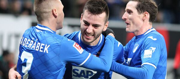 Армянский нападающий Хоффенхайма Саркис Адамян празднует забитый гол в матче первого дивизиона немецкой футбольной Бундеслиги против дортмундской Боруссии (20 декабря 2019). Зинсхайм Армянский нападающий Хоффенхайма Саркис Адамян празднует забитый гол в матче первого дивизиона немецкой футбольной Бундеслиги против дортмундской Боруссии (20 декабря 2019). Зинсхайм - Sputnik Армения