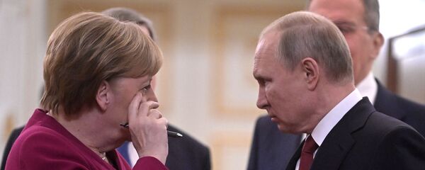 Президент России Владимир Путин и федеральный канцлер Германии Ангела Меркель перед совместной пресс-конференцией по итогам встречи (11 января 2020). Москвa - Sputnik Արմենիա