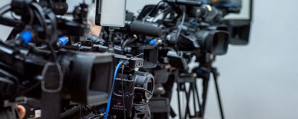 Телеоператоры за работой в пресс-центре Телеоператоры за работой в пресс-центре - Sputnik Армения