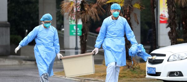 Китайские врачи в Ухане - Sputnik Արմենիա