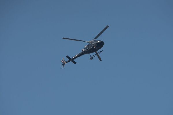  Вертолет в небе во время празднования Дня Армии (28 января 2020). Еревaн - Sputnik Армения