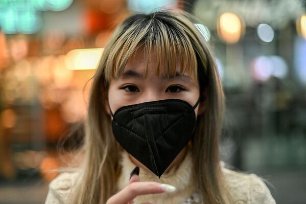 Женщина в защитной маске от распространения коронавируса в Международном аэропорту Мехико (29 января 2020). Мексика - Sputnik Армения