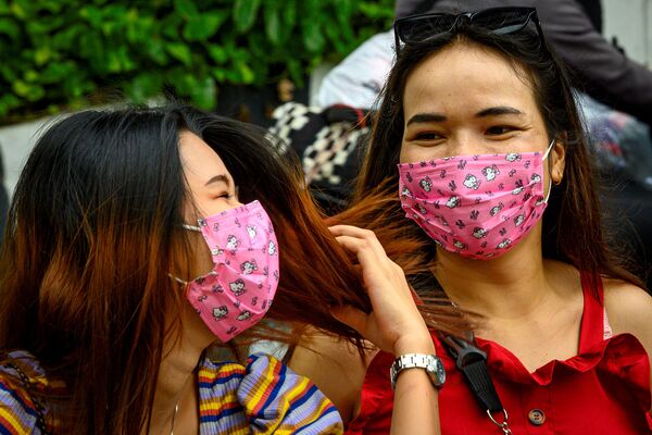 Женщины в защитных масках на улицах Бангкока где уже выявлено 19 случаев заболевания коронавирусом (3 февраля 2020). Таиланд - Sputnik Армения