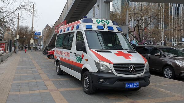 Автомобиль медицинской помощи на улице Пекина - Sputnik Армения