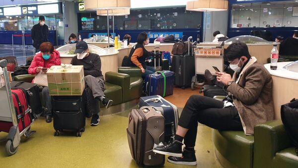Туристы в аэропорту Шоуду в Пекине - Sputnik Արմենիա