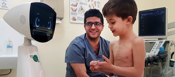 Робот Робин для поддержки детей в больницах, созданный армянской компанией Expper Робот Робин для поддержки детей в больницах, созданный армянской компанией Expper - Sputnik Армения