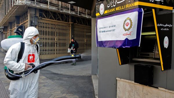 Иранские пожарные дезинфицируют улицу для защиты от коронавируса COVID-19 (5 марта 2020). Тегеран - Sputnik Армения