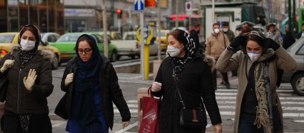 Жители Тегерана в медицинских масках на одной из центральных улиц Жители Тегерана в медицинских масках на одной из центральных улиц - Sputnik Армения