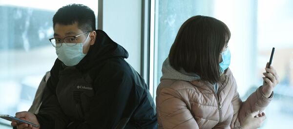 Пассажиры в медицинских масках в аэропорту Шереметьево - Sputnik Արմենիա