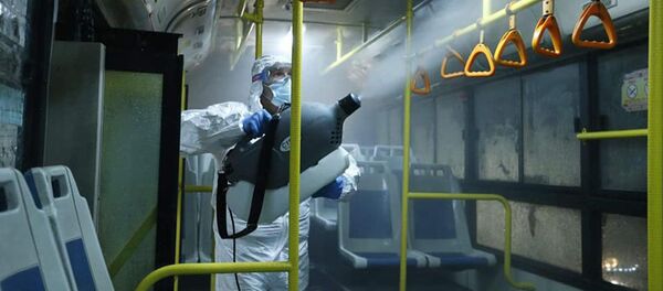 Дезинфекция общественного транспорта (14 марта 2020). Еревaн - Sputnik Армения