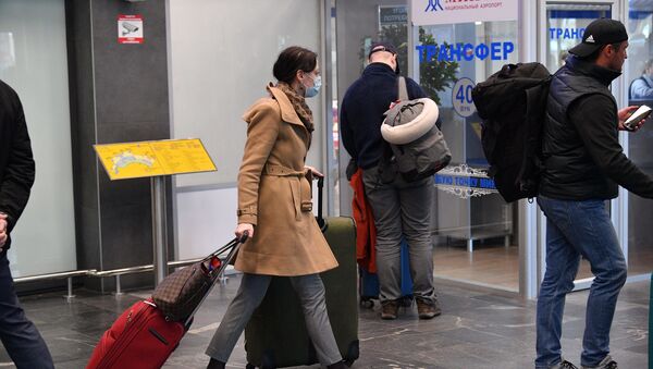 Пассажиры в аэропорту Минск - Sputnik Արմենիա