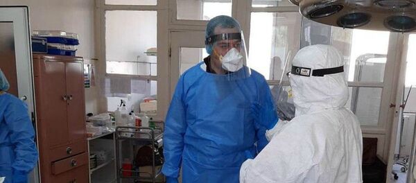 Медицинские работники во время пандемии (25 марта 2020). - Sputnik Армения