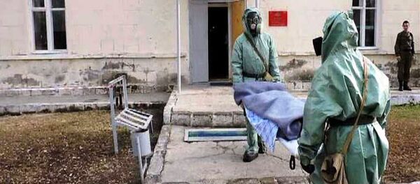 Мед.подразделения российской военной базы ЮВО отработали спец.мероприятия в условиях применения оружия массового поражения Мед.подразделения российской военной базы ЮВО отработали спец.мероприятия в условиях применения оружия массового поражения - Sputnik Армения