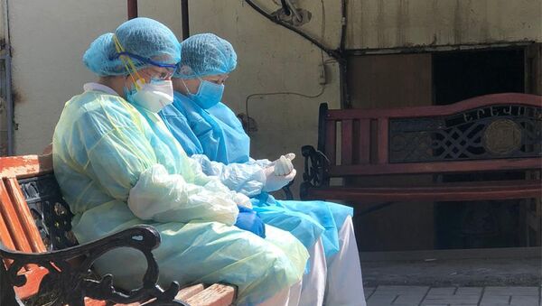 Медицинские работники во время пандемии (25 марта 2020). Еревaн - Sputnik Армения