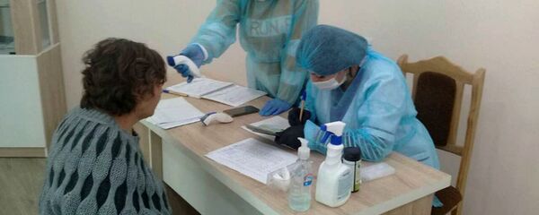 Процесс термометрии в пунктах медико-санитарного контроля Армения-Арцах (4 апреля 2020).  - Sputnik Արմենիա