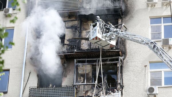 Пожар в доме на Фрунзенской набережной (14 мая 2020). Москва - Sputnik Армения