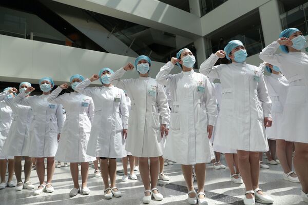 Медсестры во время мероприятия по случаю Международного дня медсестер в больнице (12 мая 2020). Китай - Sputnik Армения