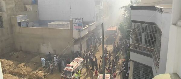 Первые кадры с места крушения пассажирского самолёта в Пакистане Первые кадры с места крушения пассажирского самолёта в Пакистане - Sputnik Արմենիա