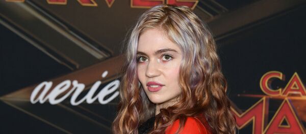 Подруга Илона Маска, канадская певица Граймс (Клэр Элиз Буше) (4 марта 2019). Голливуд Подруга Илона Маска, канадская певица Граймс (Клэр Элиз Буше) (4 марта 2019). Голливуд - Sputnik Армения