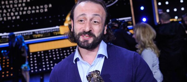 Хореограф-постановщик, продюсер ледовых шоу Илья Авербух во время церемонии вручения премии ТЭФИ (3 октября 2018). Москвa - Sputnik Армения